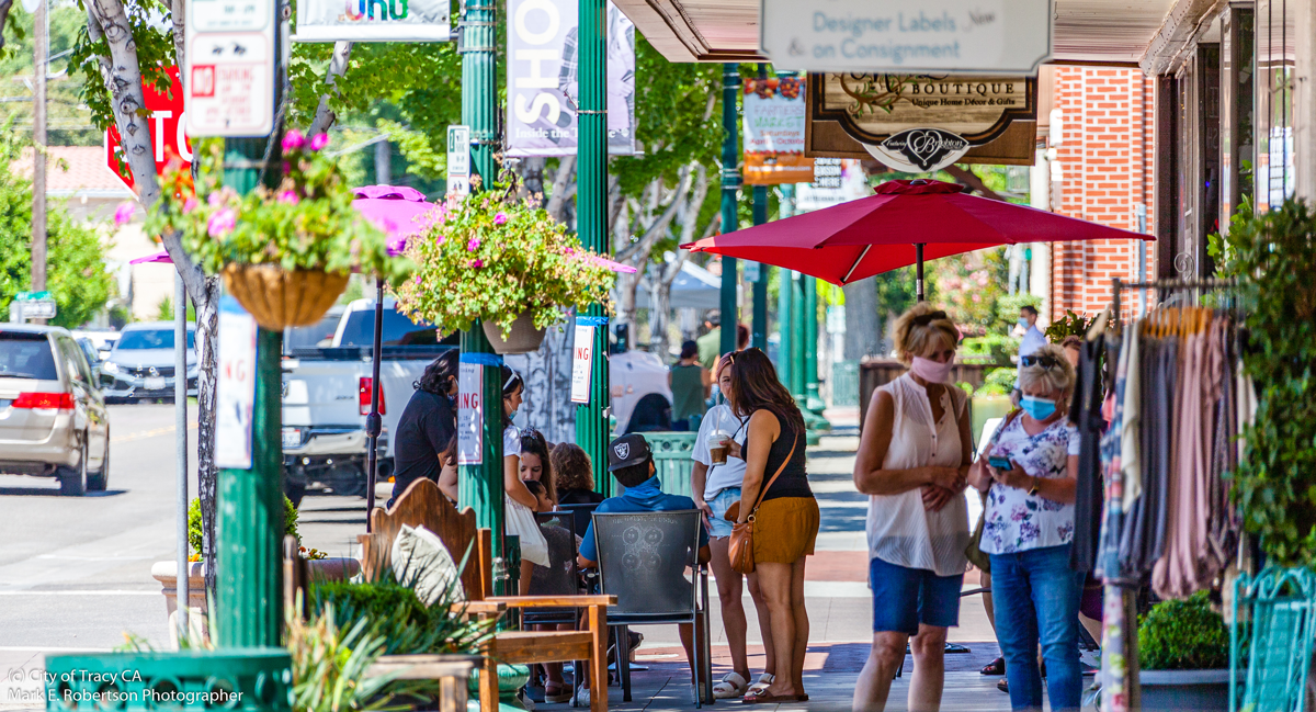 View of downtown shopping and people mingling