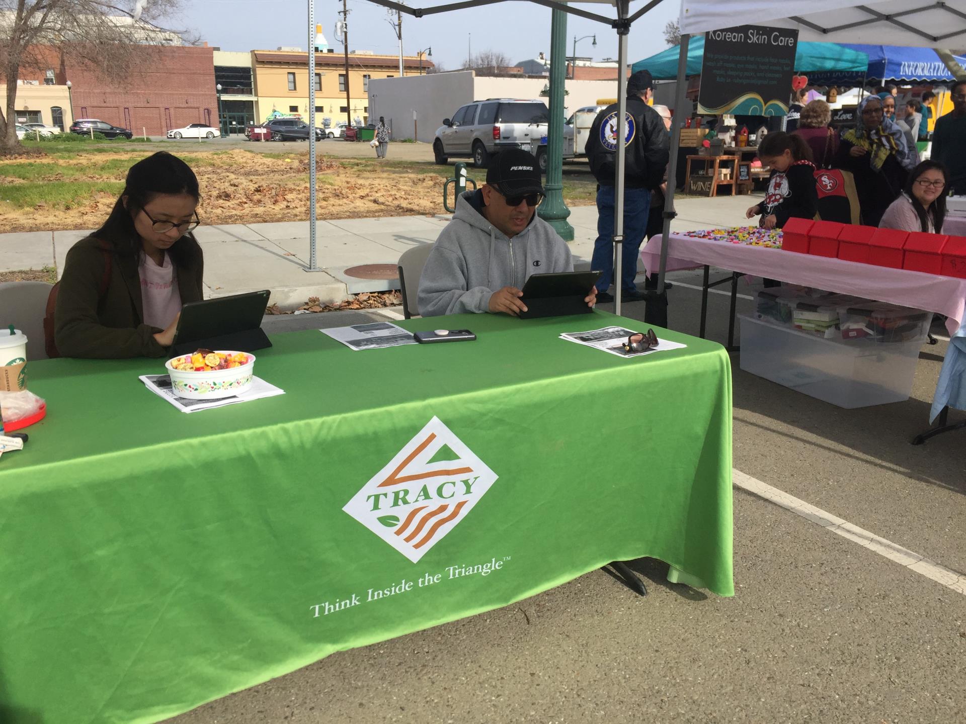 Community members participate in our LHMP online survey at the Downtown Tracy Farmers' Market